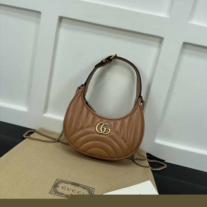 G*u*i top handle bags